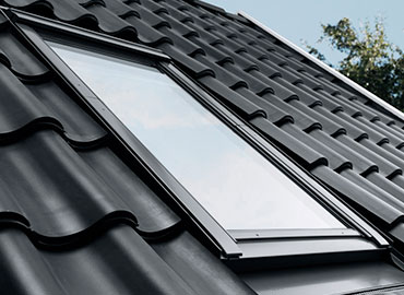 Pose de velux en Île-de-France.